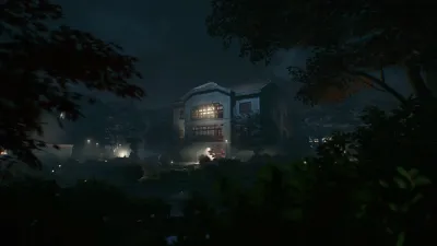 Official The Defiant screenshot of a lit building at night, shown for the game’s visual fidelity